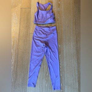 Girlfriend collective purple ribbed sports bra and leggings set